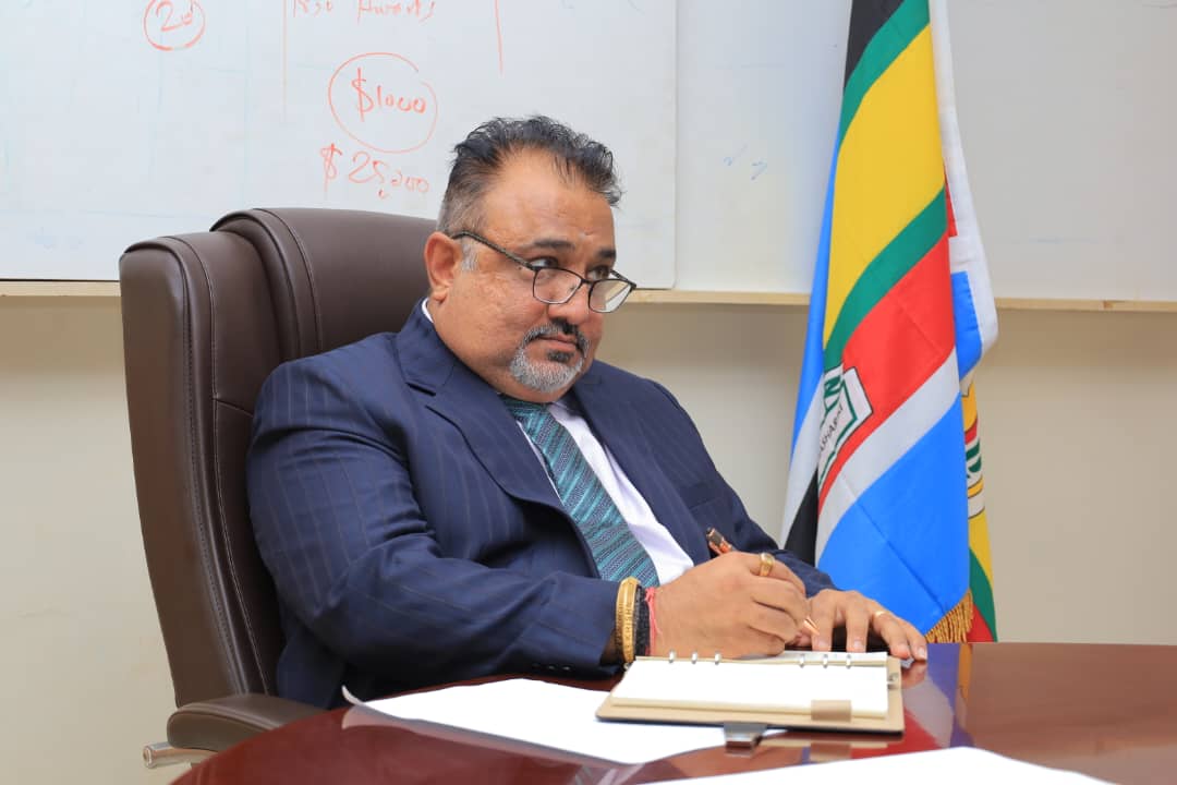 Trade Minister Sanjay Tanna meeting members of the National Standards Council to discuss improving UNBS services and supporting SMEs in Uganda.