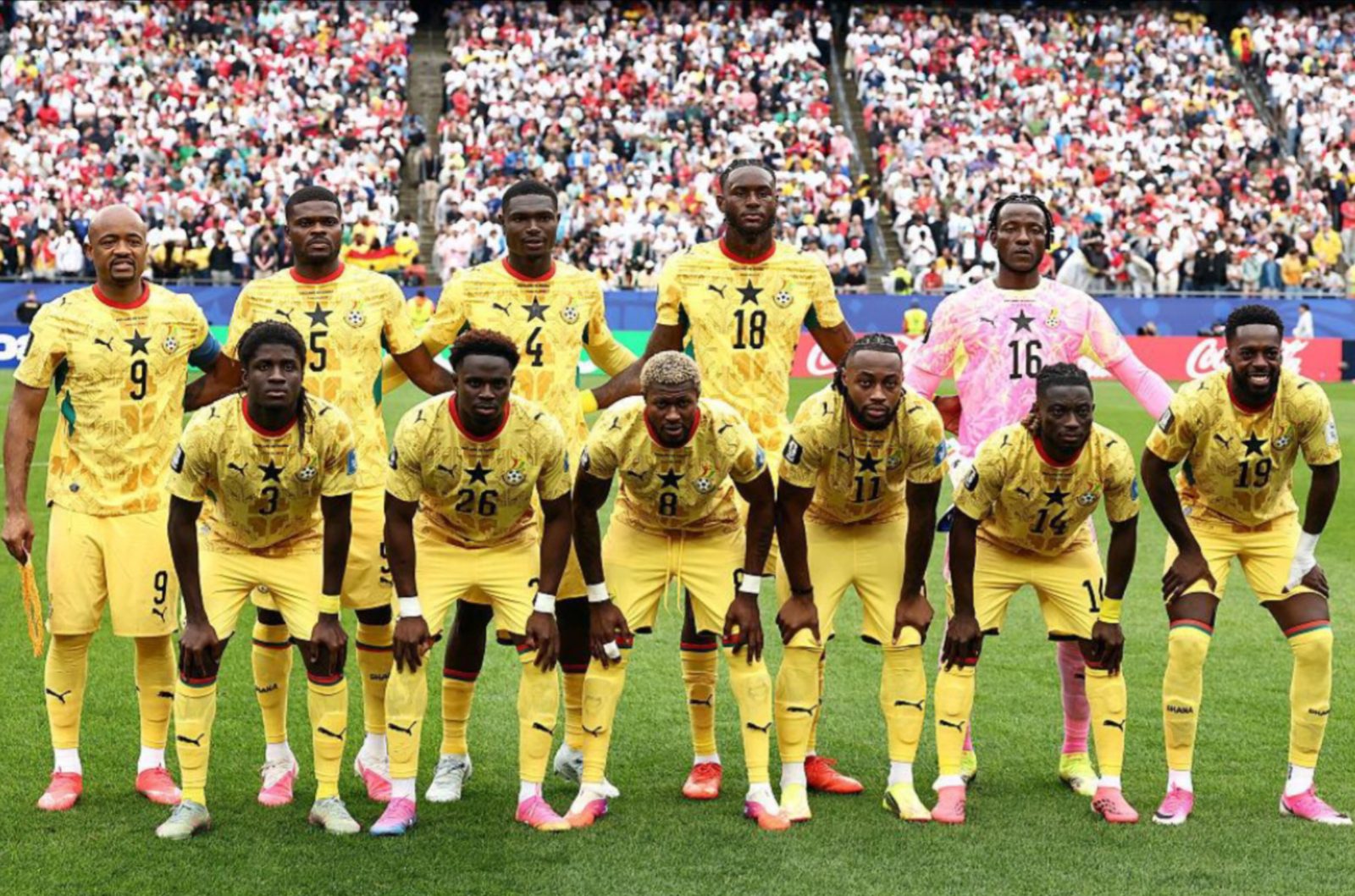 Ghana Black Stars national football team posing together ahead of a World Cup match.