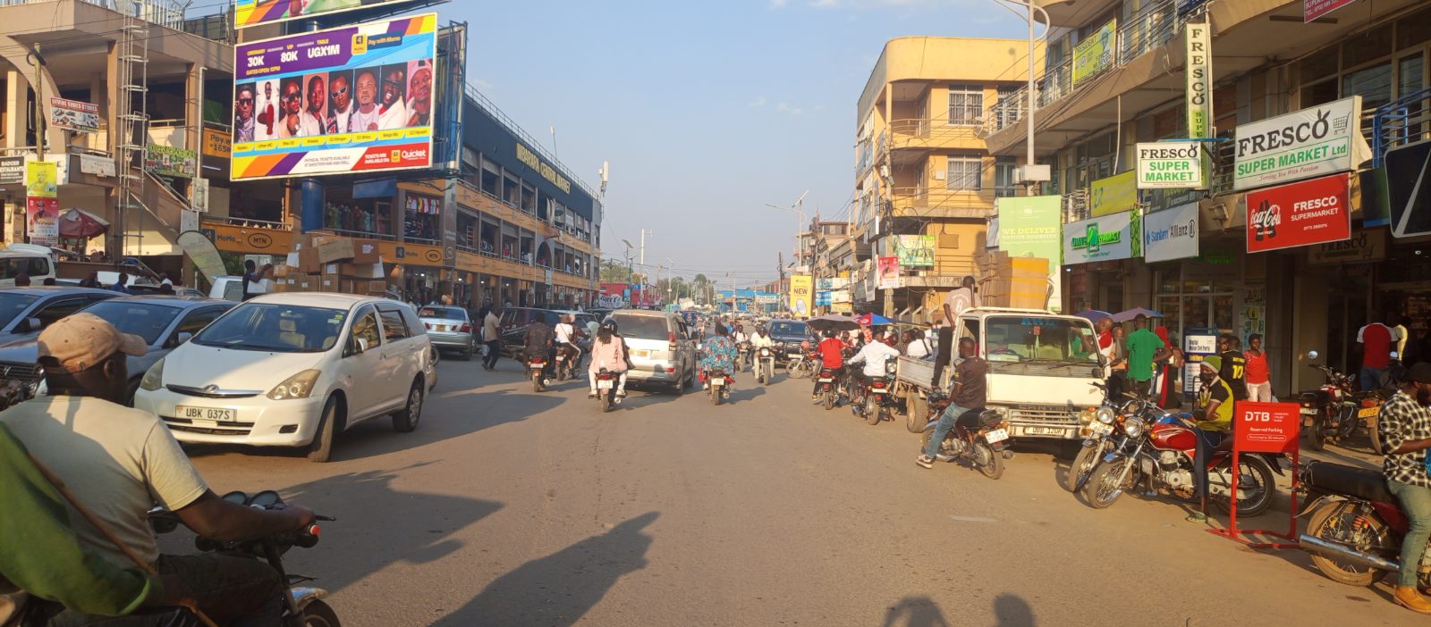 Modern multi-storey buildings and ongoing construction in Mbarara City, western Uganda
