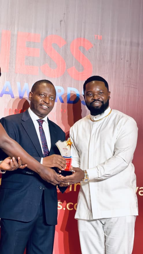 Mungu Feni receives Entrepreneur of the Year recognition at the 2026 Business Excellence Awards in Kampala.