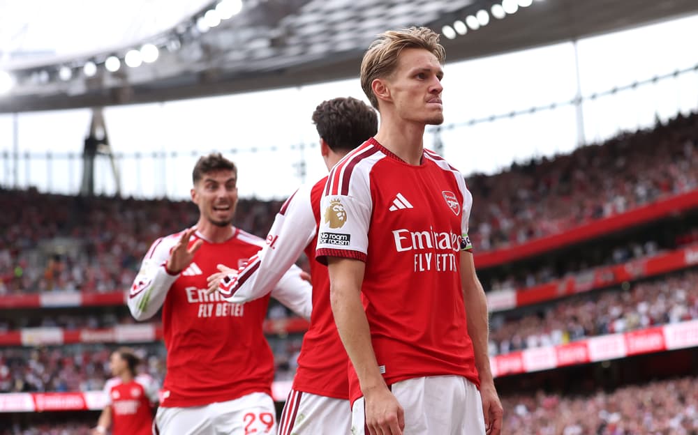 Arsenal players celebrating their 2–1 victory over Chelsea in the Premier League