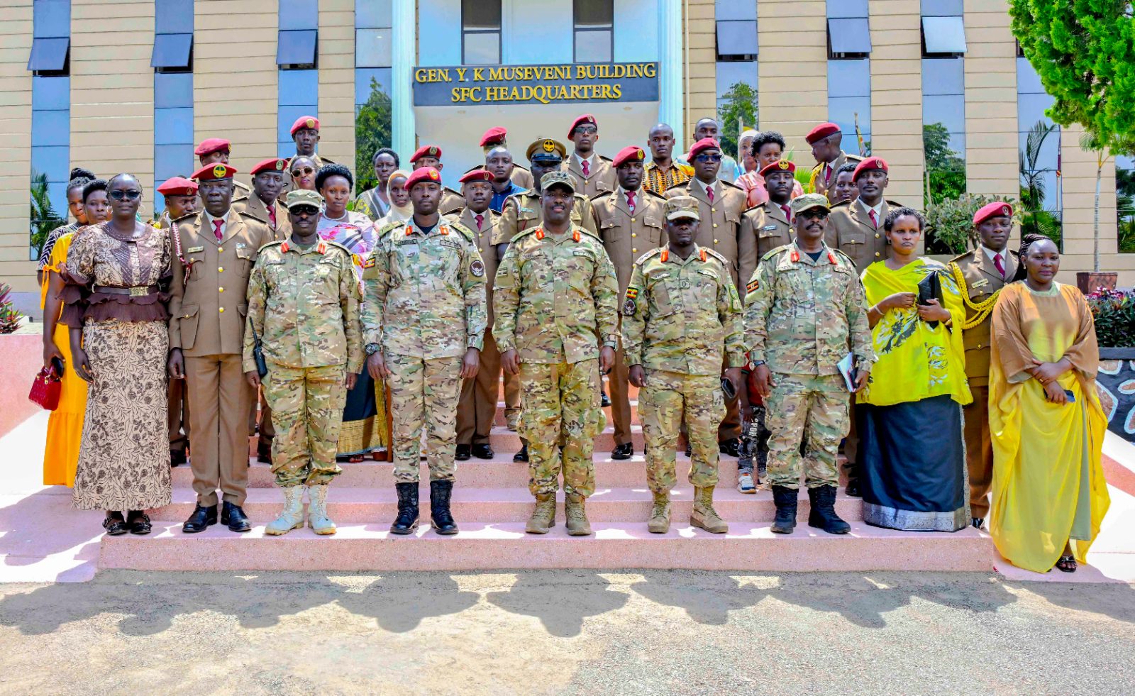 SFC officers and commanders pose for a group photograph during a ceremony to decorate 62 officers promoted to new ranks in Entebbe.