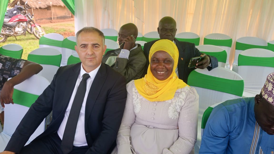TIKA representatives present agricultural tools and vocational training materials to cocoa farmers and students at a handover ceremony in Yumbe district, Uganda.